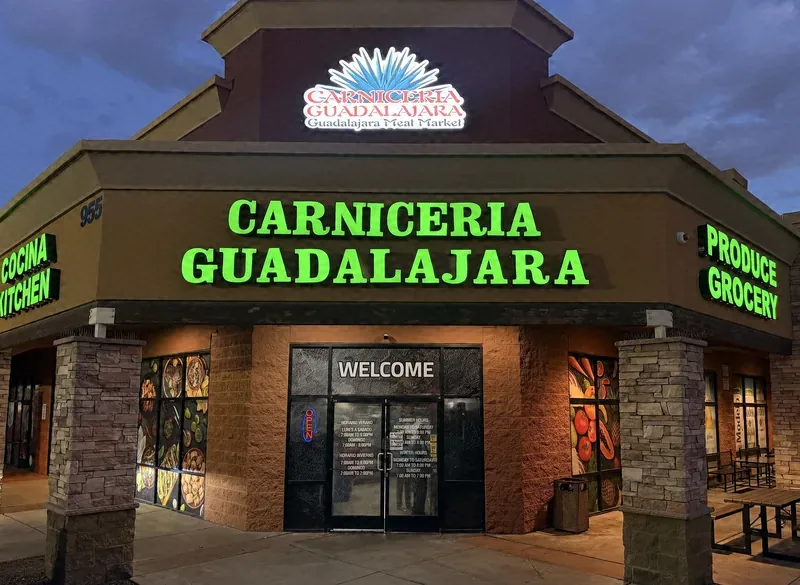 Carniceria Guadalajara storefront at 955 W Craig Rd, North Las Vegas, sign lit at dusk